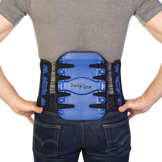 Person wearing a BackFlex lumbar support brace with blue rigid panel across the lower back.