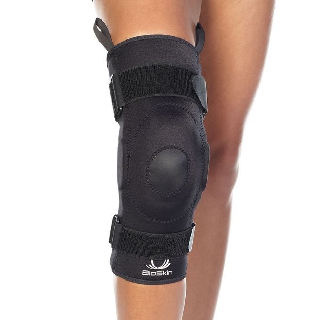 Close-up of a leg fitted with a BioSkin knee brace providing compression and stability support.